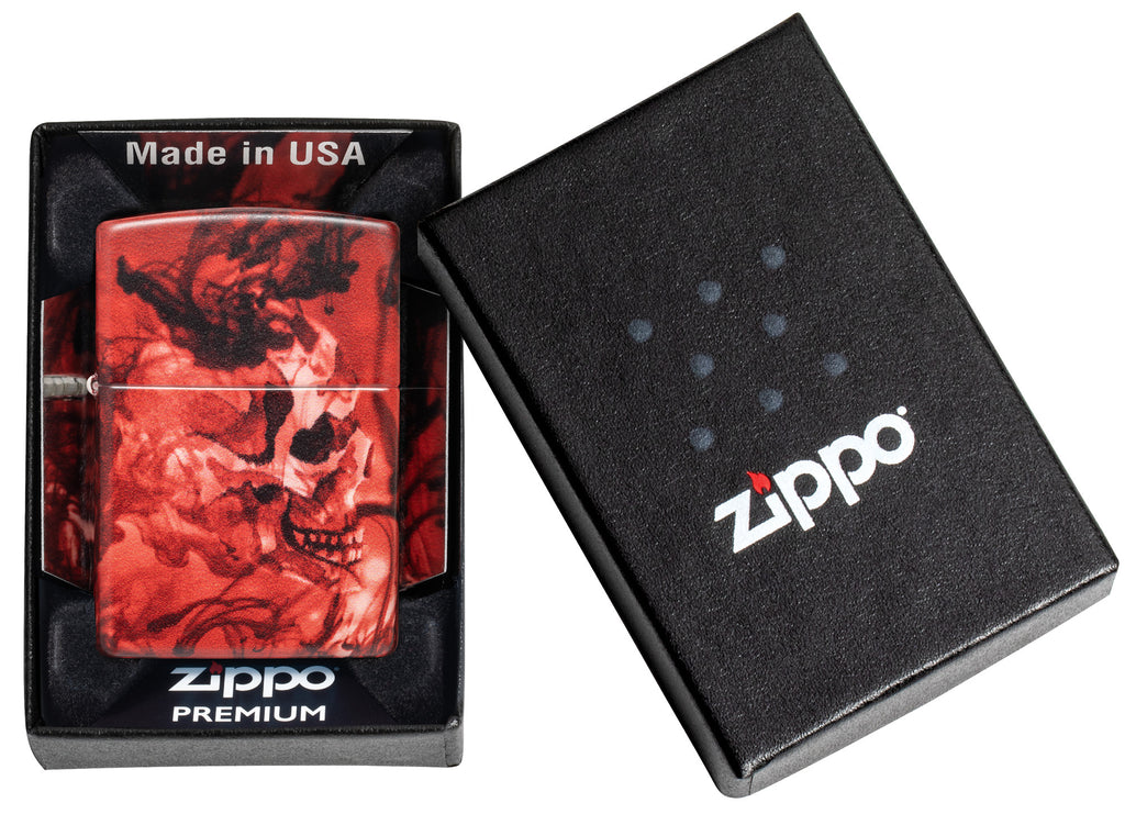 Zippo Spooky Skulls 540 Matte Windproof Lighter in its packaging.