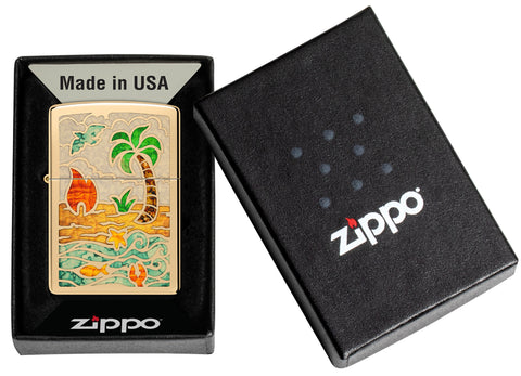 Zippo Beach Day Design High Polish Brass Windproof Lighter in its packaging.