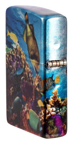 Angled shot of Zippo Deep Sea Design 540 Tumbled Chrome Windproof Lighter showing the back and hinge side of the lighter.
