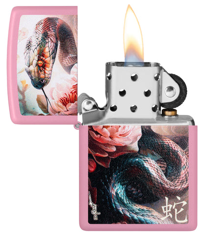 Zippo MazziÂ® Snake and Flower Design Pink Matte Windproof Lighter with its lid open and lit.