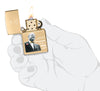 Zippo 2023 Founder's Day Collectible Armor High Polish Brass Windproof Lighter lit in hand.