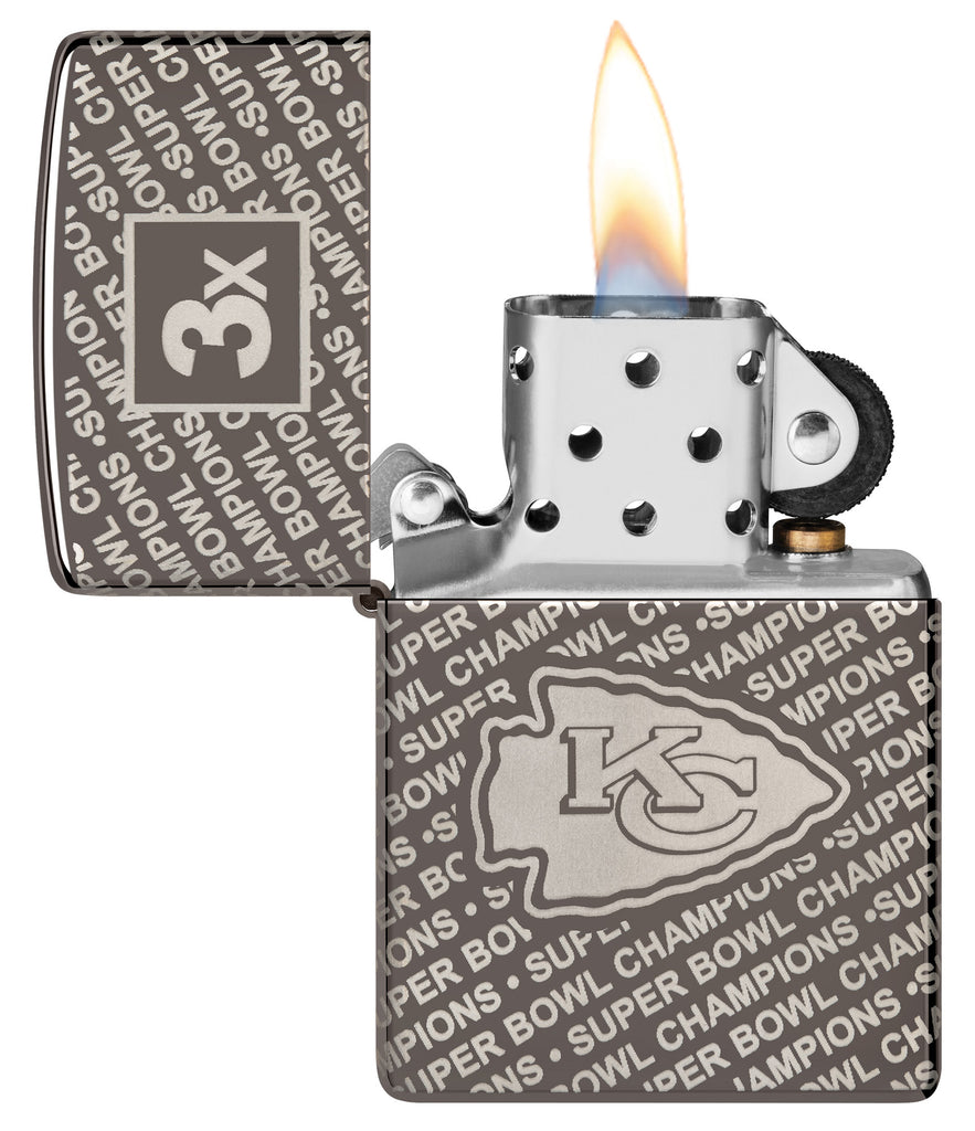 Zippo NFL Kansas City Chiefs Super Bowl Commemorative Armor Black Ice Windproof Lighter with its lid open and lit.