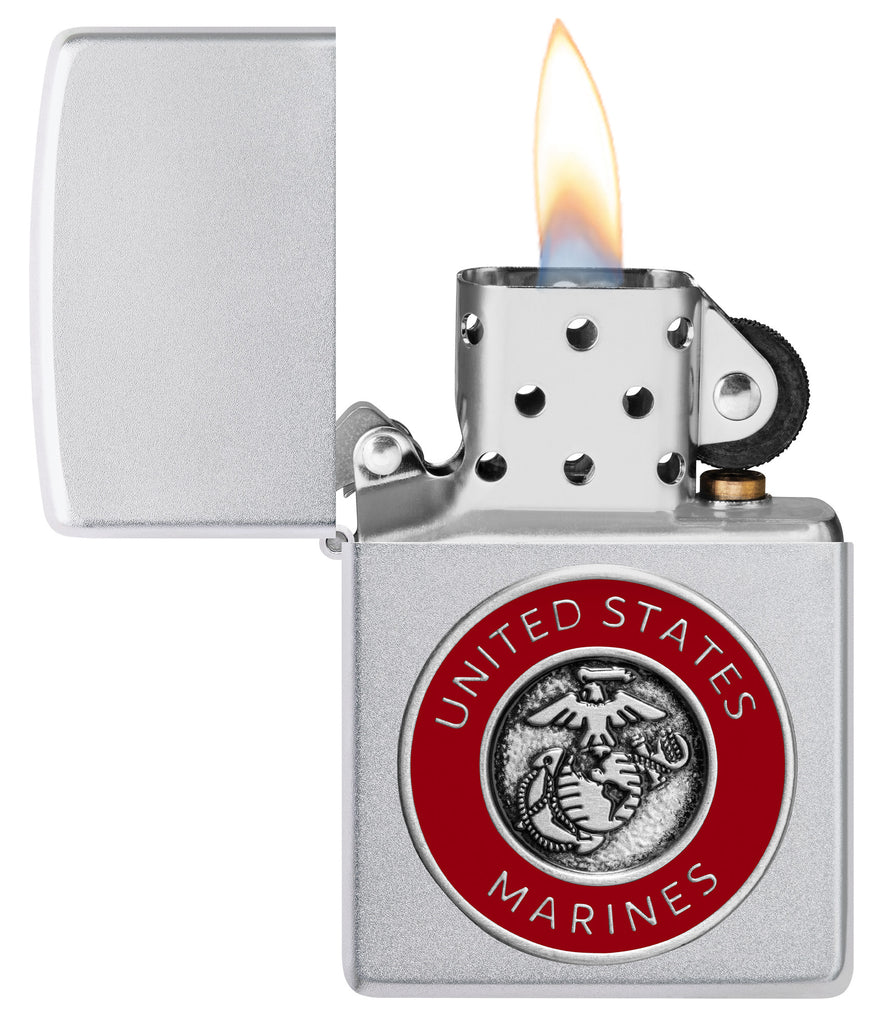 Zippo United States Marines Emblem Satin Chrome Windproof Lighter with its lid open and lit.
