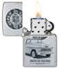 Zippo Chevrolet Street Chrome Pocket Lighter with its lid open and lit.