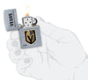 NHL Vegas Golden Knights Street Chrome™ Windproof Lighter lit in hand