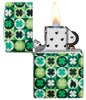 Zippo Clover Design Glow in the Dark Green Matte Windproof Lighter with its lid open and lit.