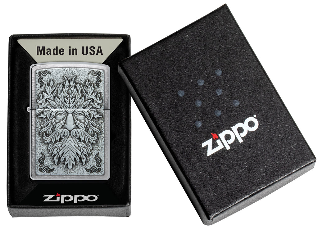 Zippo Greenman Emblem Brushed Chrome Windproof Lighter in its packaging.