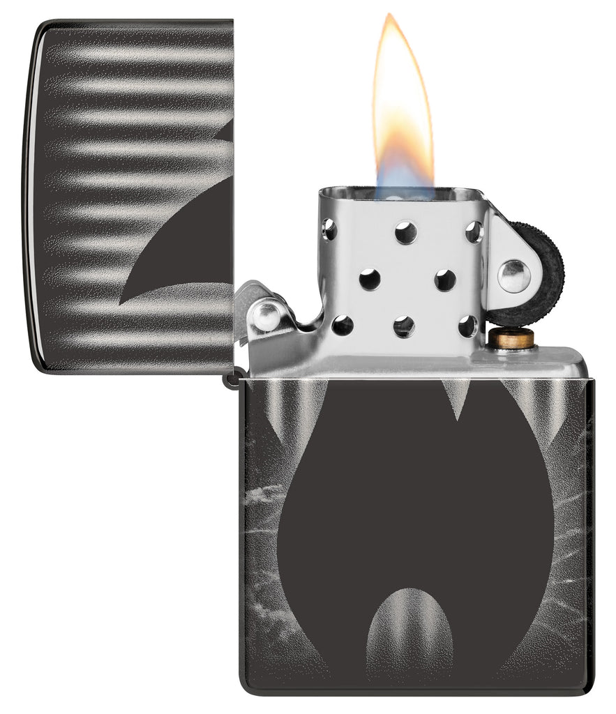 Zippo Design High Polish Black Windproof Lighter with its lid open and lit.