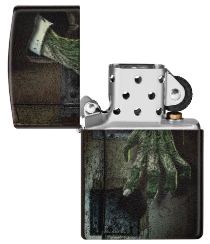 Glow In the Dark Zombie Hand Windproof Lighter with its lid open and unlit.