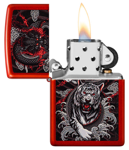 Zippo Dragon Tiger Design Metallic Red Windproof Lighter with its lid open and lit.