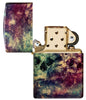 Zippo Galaxy Skull Design 540 Tumbled Brass Windproof Lighter with its lid open and unlit.