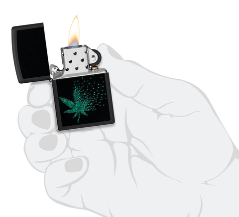 Zippo Black Light Pixel Cannabis Design Black Matte Windproof Lighter lit in hand.