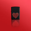 Lifestyle image of Zippo Heart Design Black Matte Windproof Lighter standing in a red scene.