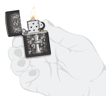 Zippo Chess Design High Polish Black Windproof Lighter lit in hand.