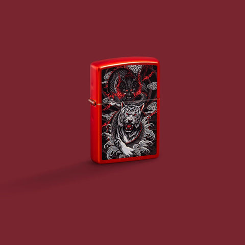 Lifestyle image of Zippo Dragon Tiger Design Metallic Red Windproof Lighter on a red background.