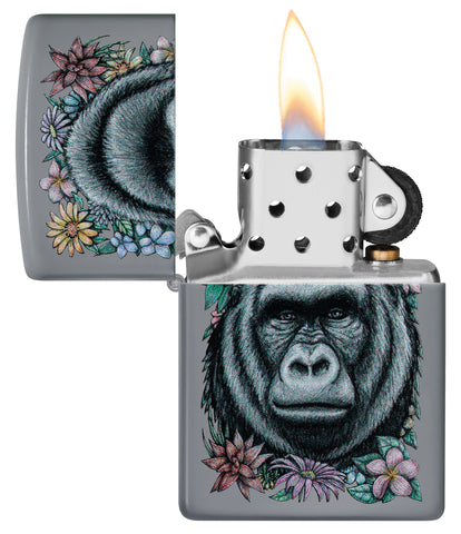 Zippo Floral Gorilla Design Flat Grey Windproof Lighter with its lid open and lit.