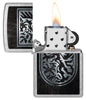 Zippo Dragon Shield Design Street Chrome Windproof Lighter with its lid open and lit.