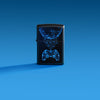 Lifestyle image of Zippo Gaming Black Matte Windproof Lighter on a blue ombre background.