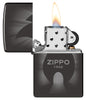 Zippo Radiant Zippo Design High Polish Black Windproof Lighter with its lid open and lit.