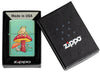 Zippo Mystical Frog Design High Polish Green Windproof Lighter in its packaging.