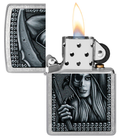 Zippo Grim Beauty Design Street Chrome Windproof Lighter with its lid open and lit.