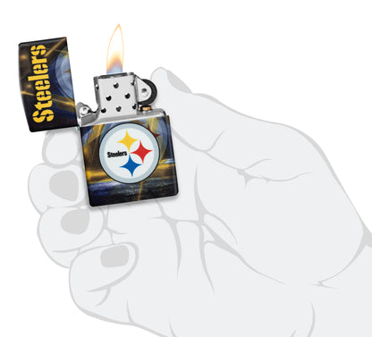 Zippo NFL Pittsburgh Steelers 540 Matte Windproof Lighter lit in hand.