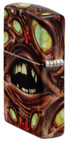 Extreme angle of Zippo Glow in the Dark Zombie Eye Windproof Lighter showing in the back and hinge side of the lighter.