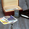 Front view of the Death Card Design Lighter standing next to tarot cards on a wooden background 