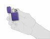 Slim Purple Matte Zippo Logo Windproof Lighter lit in hand