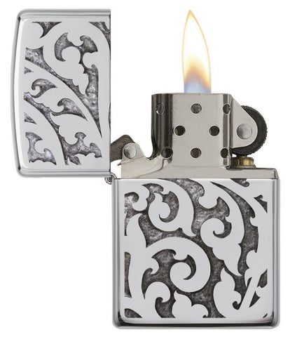 High Polish Chrome Filigree Windproof Lighter with its lid open and lit.