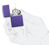 Purple Matte windproof lighter lit in hand