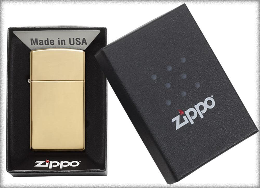 SlimÂ® High Polish Brass Finish Windproof Lighter in its packaging.