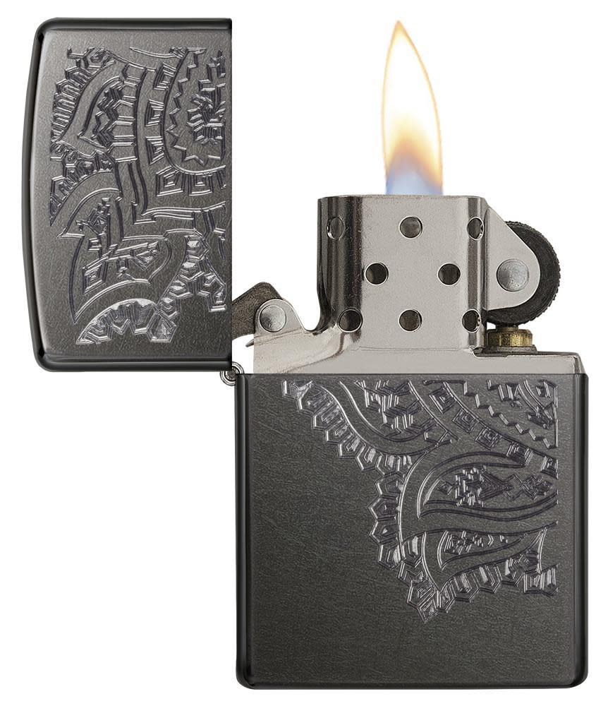 Iced Paisley Gray Windproof Lighter with its lid open and lit