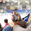 Lifestyle image of Silver Heatbank 9s Plus in hand at hockey game