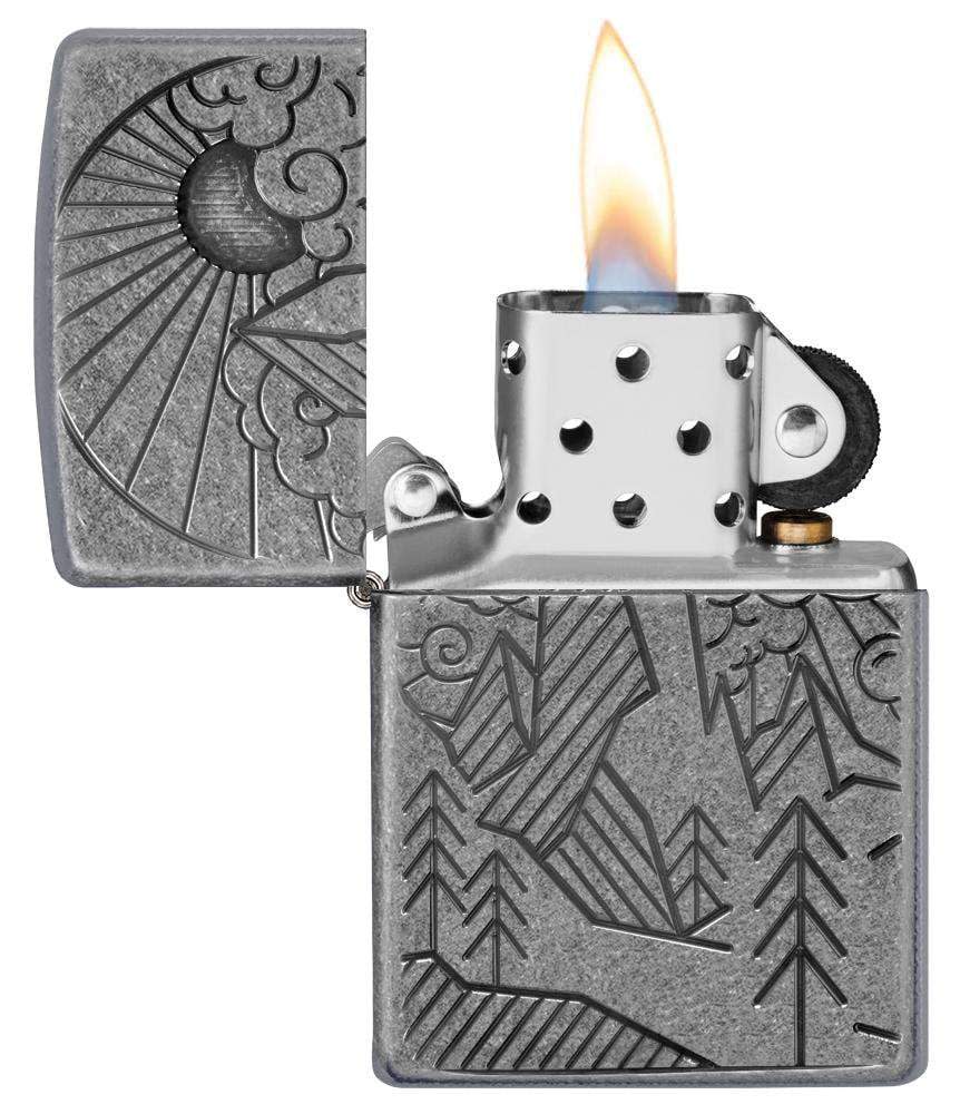 Armor® Antique Silver Mountain Design Windproof Lighter with its lid open and lit