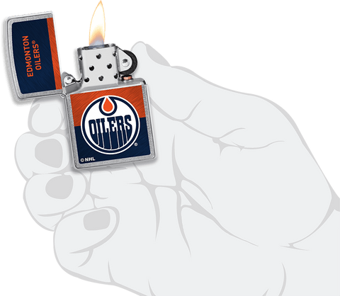 NHL® Edmonton Oilers Street Chrome™ Windproof Lighter lit in hand