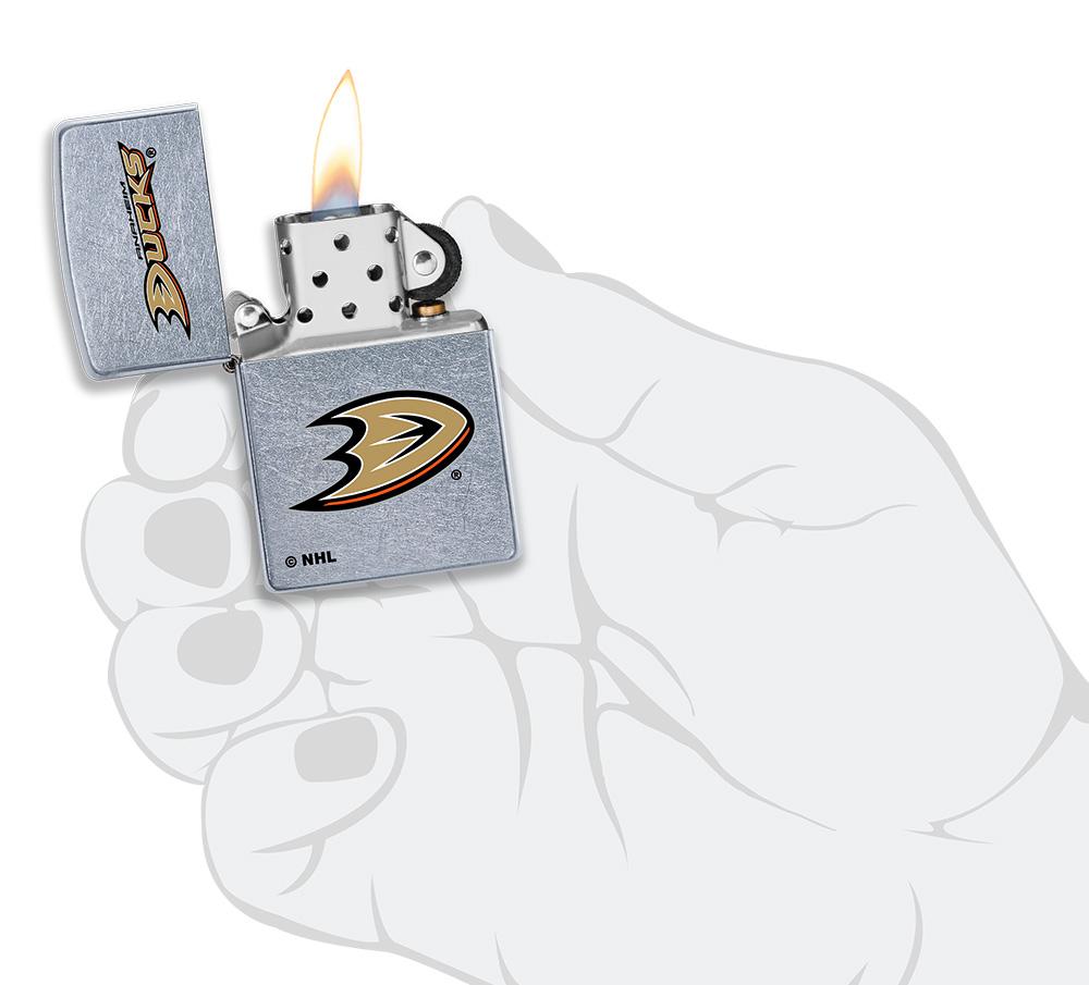 ©NHL Anaheim Ducks Street Chrome™ Windproof Lighter lit in hand