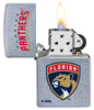 NHL Florida Panthers Street Chrome™ Windproof Lighter with its lid open and lit