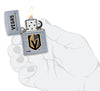 ©NHL Vegas Golden Knights Street Chrome™ Windproof Lighter lit in hand