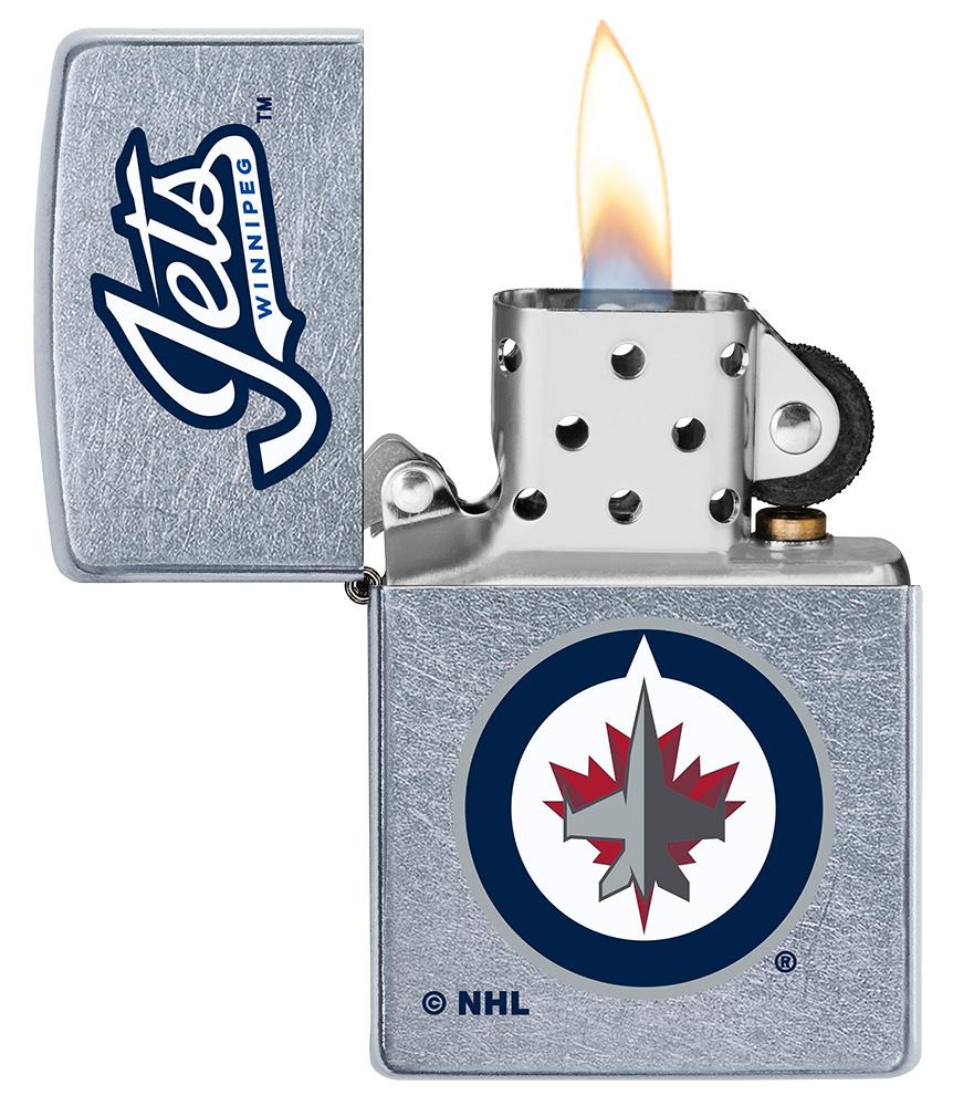 ©NHL Winnipeg Jets Street Chrome™ Windproof Lighter with its lid open and lit