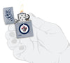 ©NHL Winnipeg Jets Street Chrome™ Windproof Lighter lit in hand