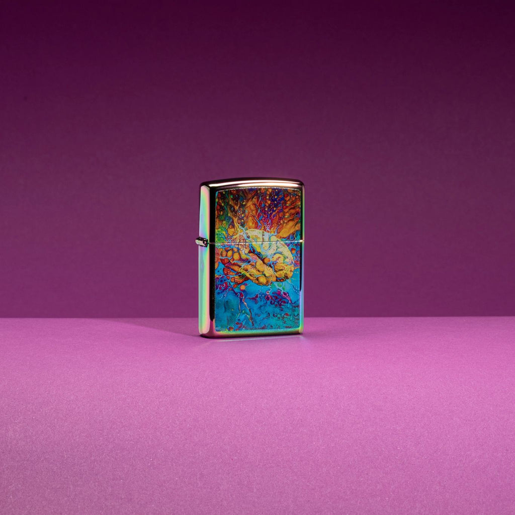 Lifestyle image of Psychedelic Brain Design Multi Color Windproof Lighter standing in a purple scene.
