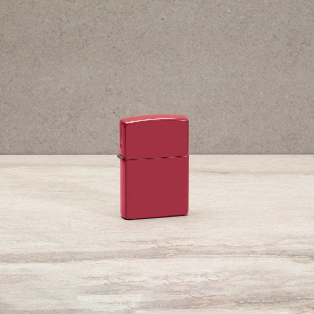 Lifestyle image of Classic Brick Windproof Lighter standing on a countertop. 