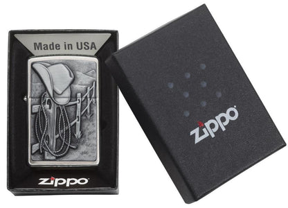 Resting Cowboy Windproof Lighter in its packaging.
