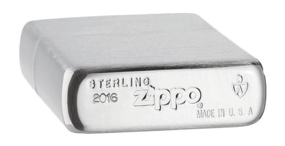 ArmorÂ® High Polish Sterling Silver Windproof Lighter laying flat showing the bottom stamp