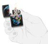 Colorful Skull Black Matte Windproof Lighter lit in hand