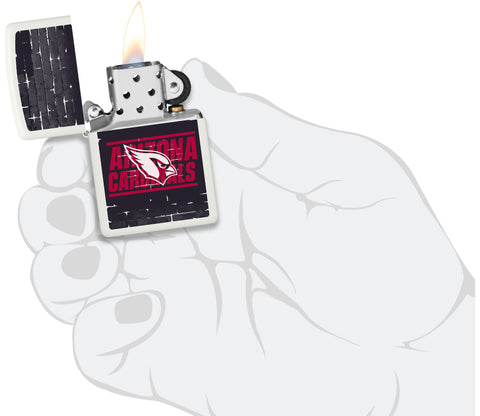 NFL Draft Arizona Cardinals Windproof Lighter lit in hand.