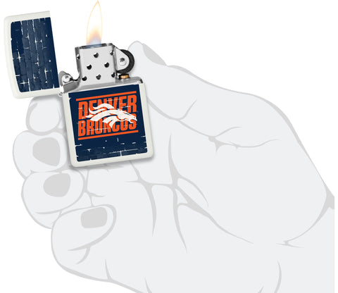 NFL Draft Denver Broncos Windproof Lighter lit in hand.
