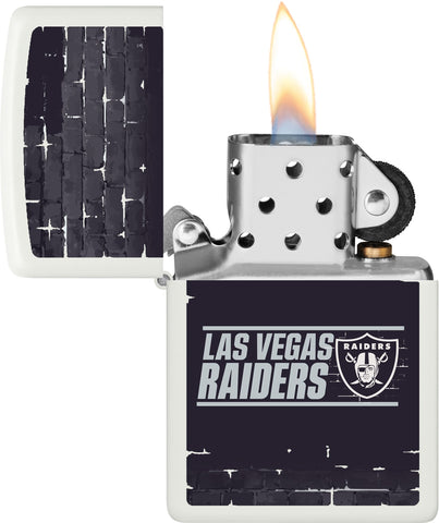 NFL Draft Las Vegas Raiders Windproof Lighter with its lid open and lit.