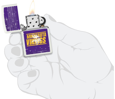 NFL Draft Minnesota Vikings Windproof Lighter lit in hand.